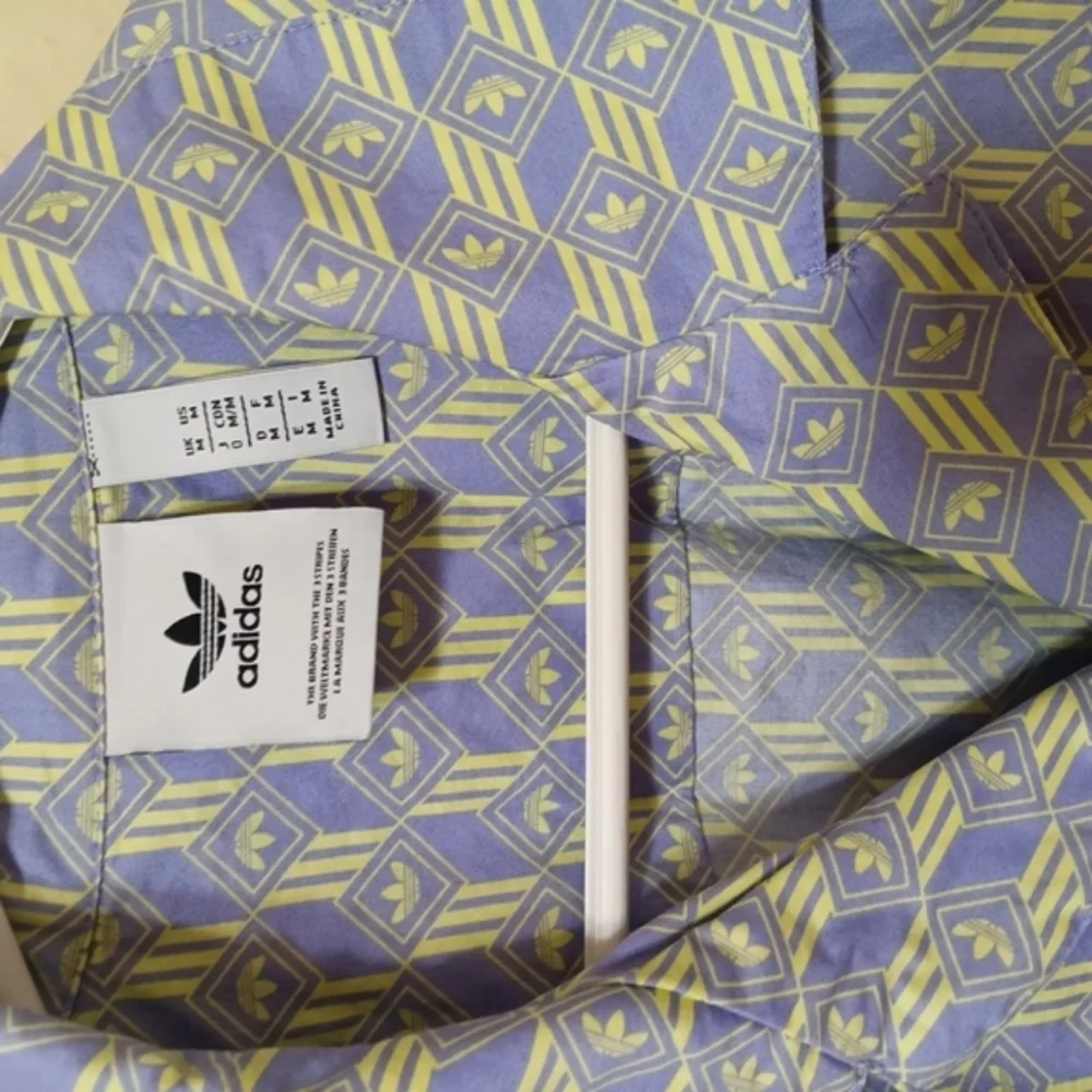 Adidas Men's Blue and Yellow Patterned Shirt